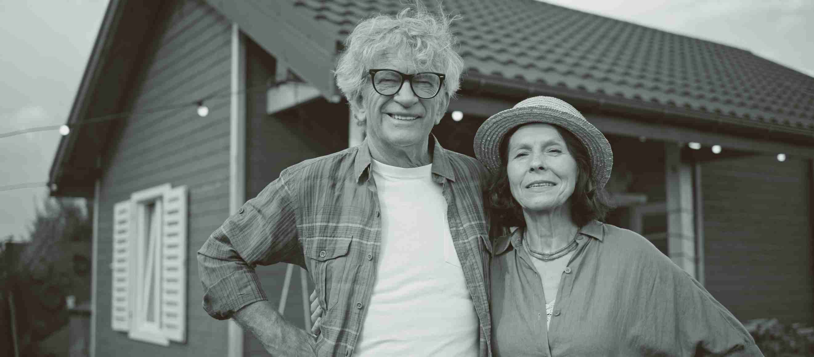 Couple outside house
